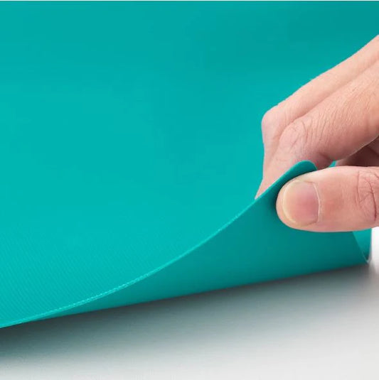 FINFÖRDELA Bendable chopping board, dark grey/dark turquoise