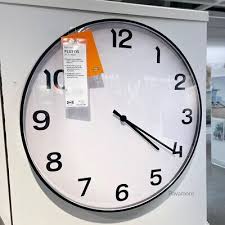 PLUTTIS Wall clock , 28cm
